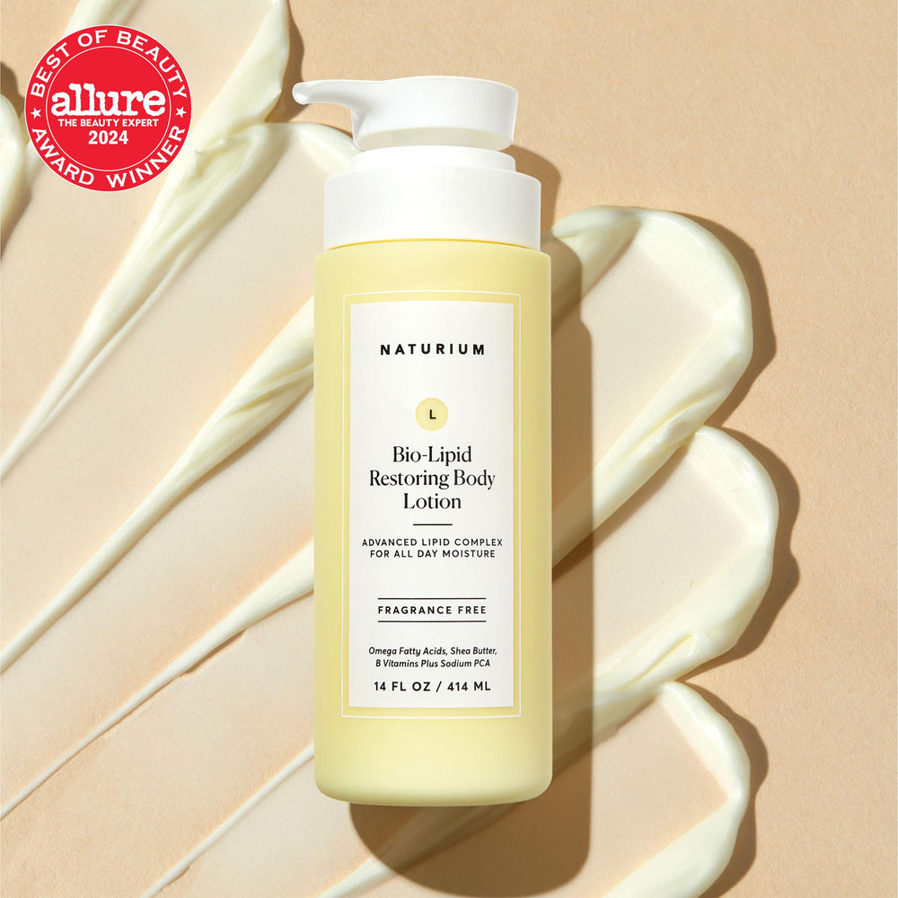 Naturium Bio-Lipid Restoring Body Lotion texture closeup with creamy, soothing moisture.