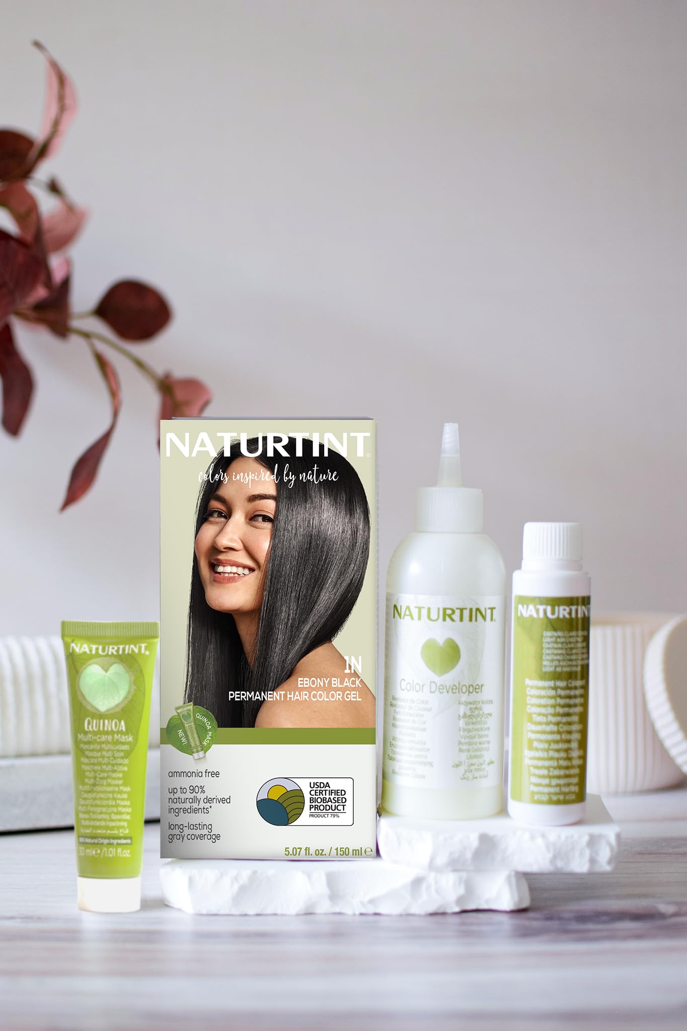 Naturtint 1N Ebony Black at-home application scene demonstrates easy, mess-free coloring.