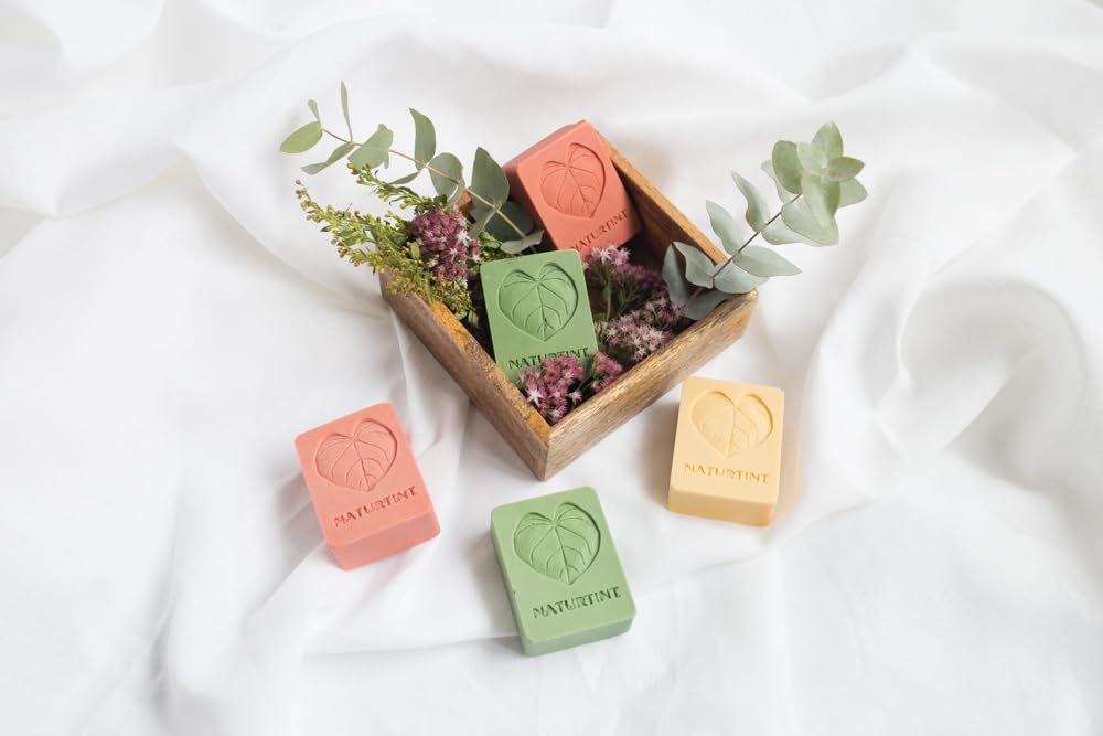 Naturtint shampoo bar orange rinse demonstrates easy, residue-free finish.