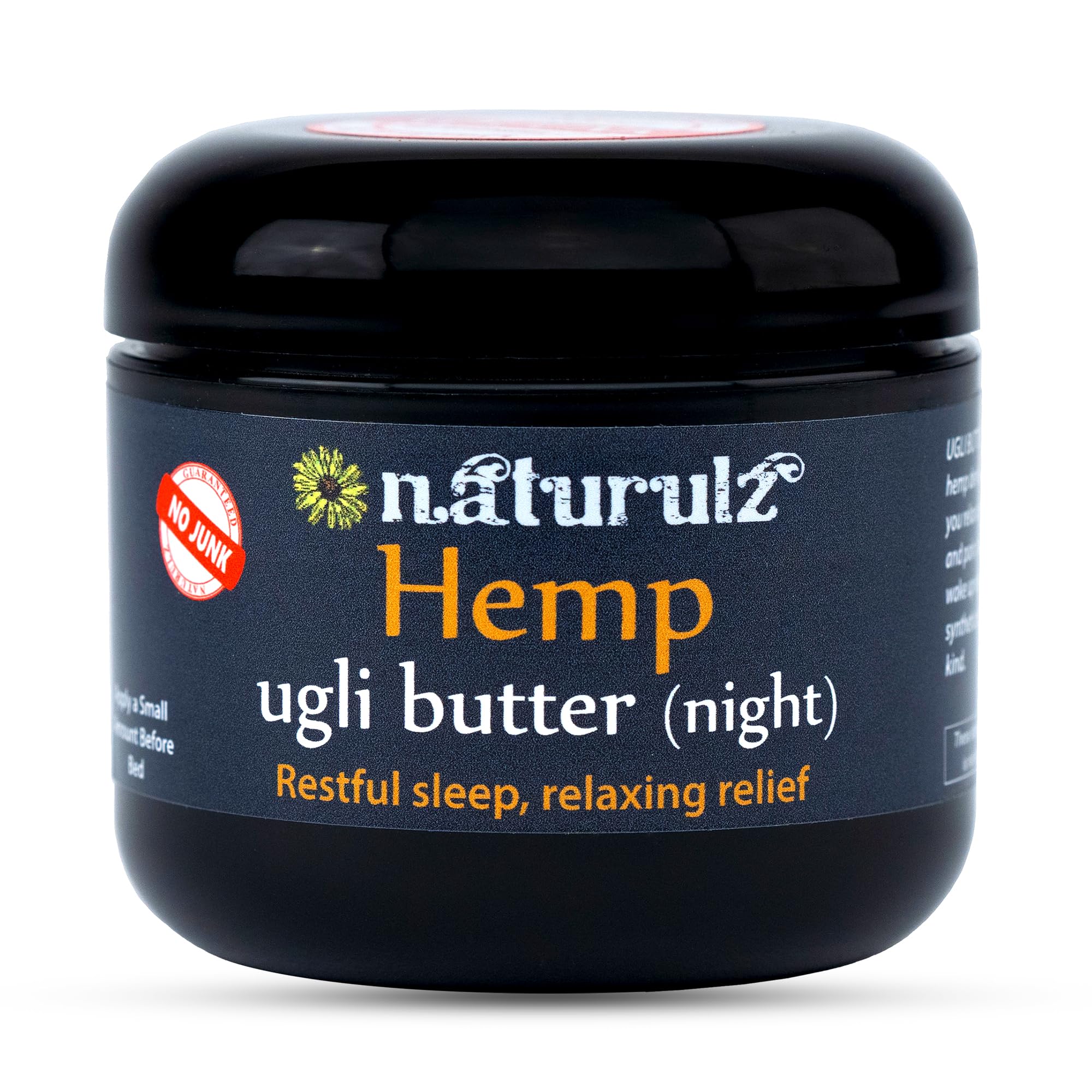 Naturulz Ugli Butter Night Cream bottle on nightstand ready for nightly routine.