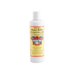 Sunlit beach scene featuring Maui Babe Browning Lotion bottle and golden tan glow.
