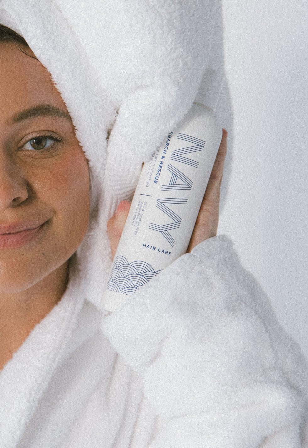 NAVY HAIR CARE Search and Rescue shampoo foamy lather on scalp, cleansing action.