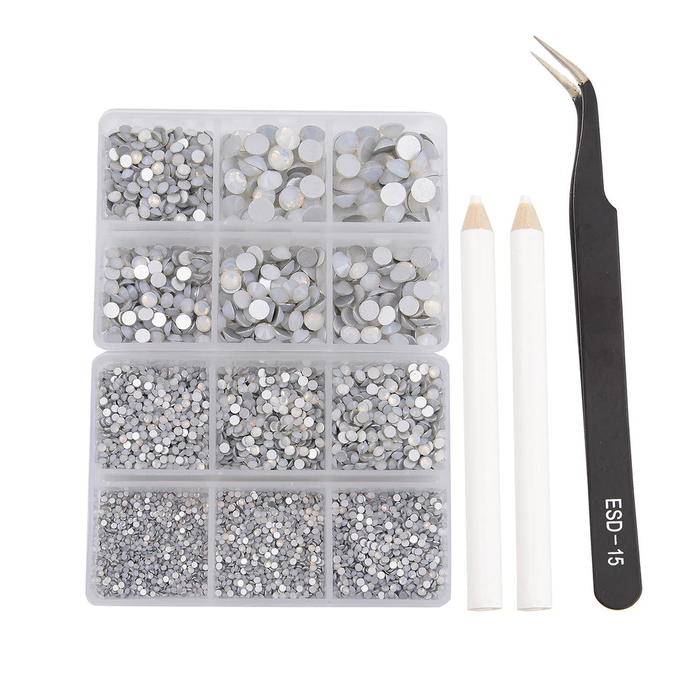 NCB 8000pcs rhinestones closeup shows varied sizes for precision nail art and crafts.