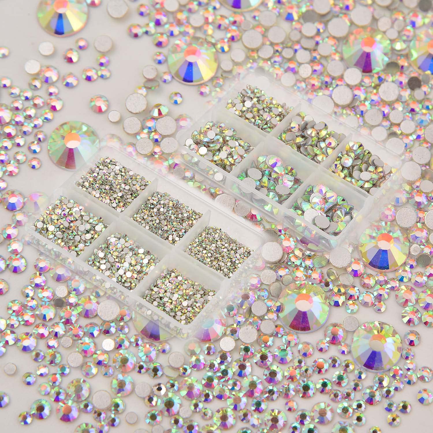 Nail art example using crystal glass rhinestones on a glossy manicure