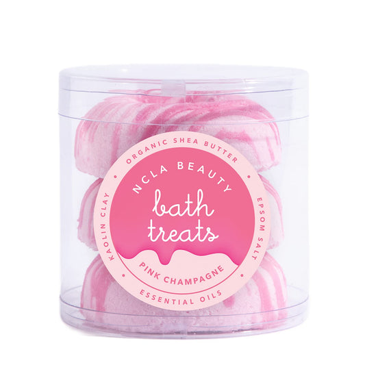 NCLA Beauty Pink Champagne donut bath bombs ready to fizz and soften skin.
