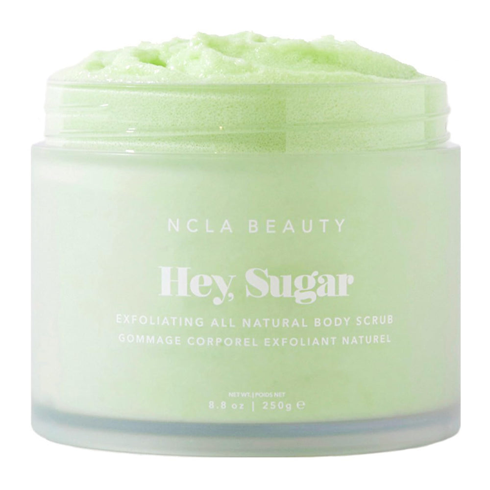 NCLA Beauty Hey Sugar body scrub jar showing exfoliating texture for smoother skin.