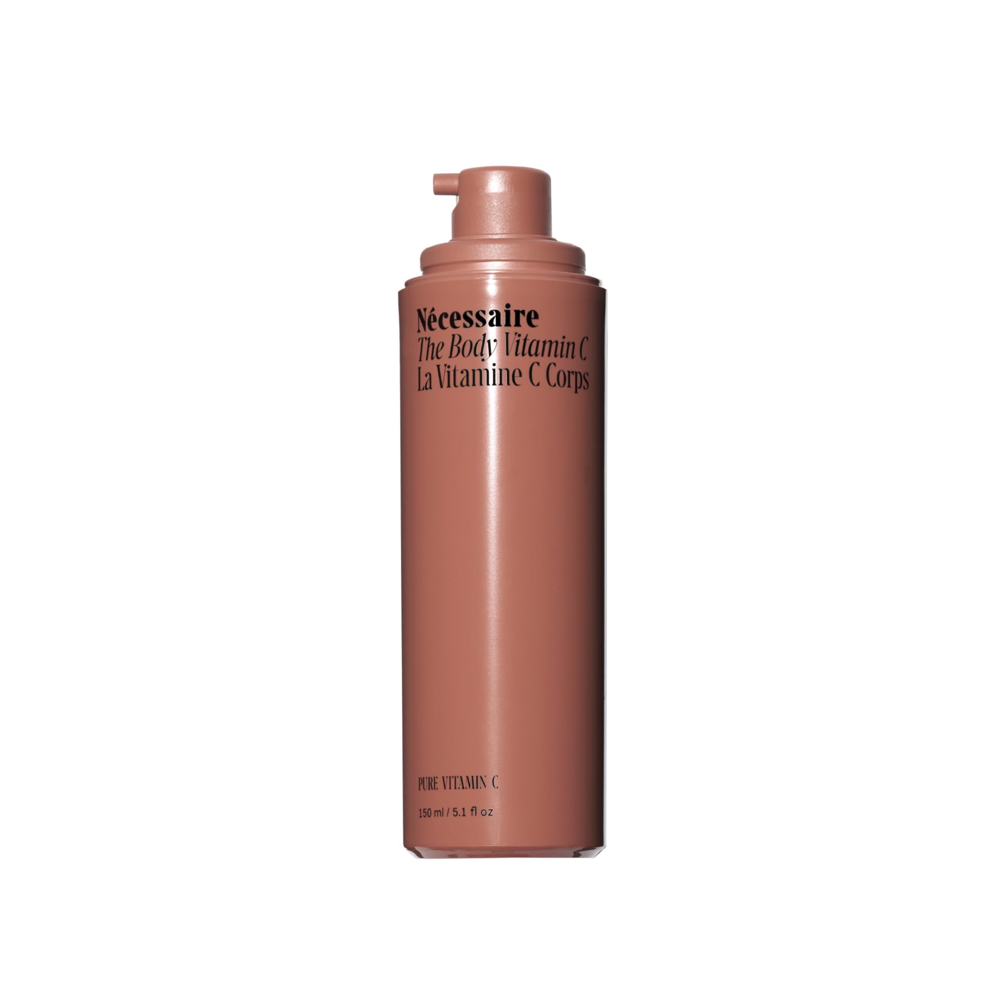 Nécessaire The Body Vitamin C Serum bottle on a vanity for daily radiance.