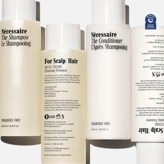 Nécessaire Hair Duo shampoo foam close-up, gentle cleansing for scalp health.
