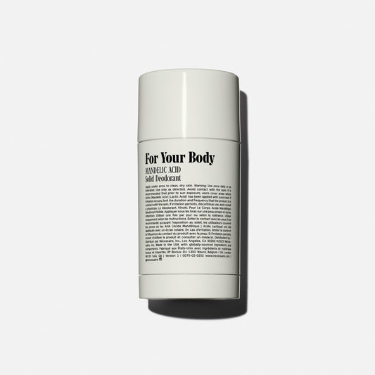 Nécessaire Hinoki bottle close-up highlighting mandelic acid formula