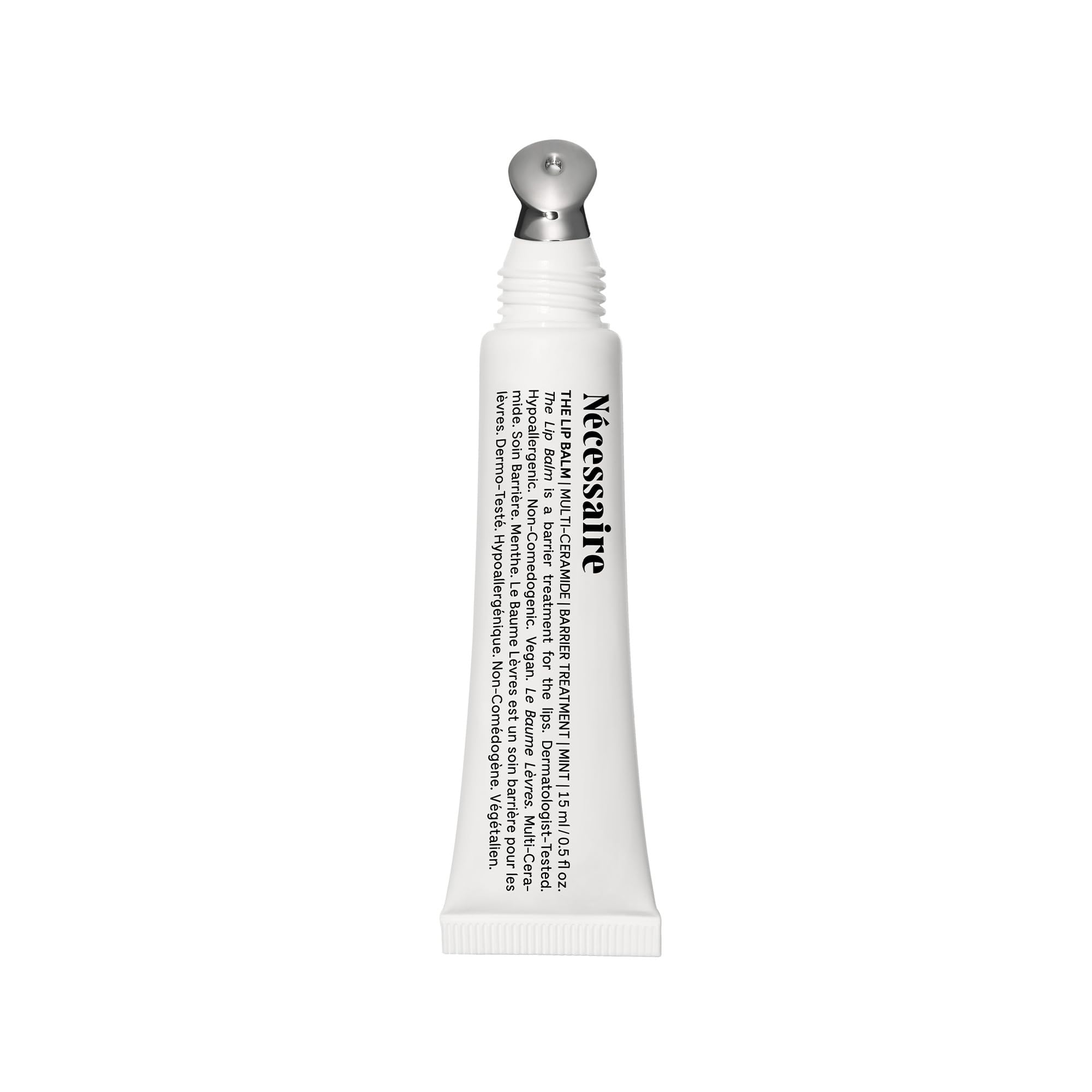 Nécessaire Lip Balm tube application for on-the-go hydration.