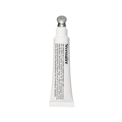 Nécessaire Lip Balm tube application for on-the-go hydration.