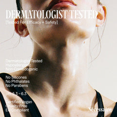 Dermatologist-tested badge on Nécessaire Neck Serum packaging.
