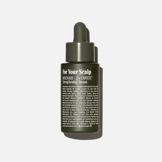 Nécessaire Rosemary Serum dropper applying to scalp for quick-dry hydration