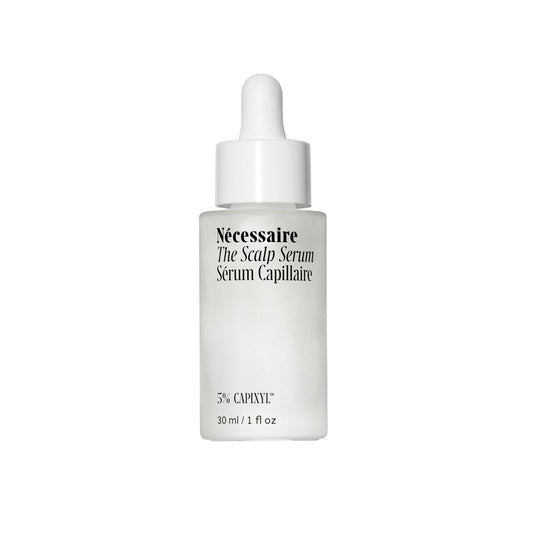 Nécessaire Scalp Serum bottle close-up, fragrance-free formula for sensitive scalps.