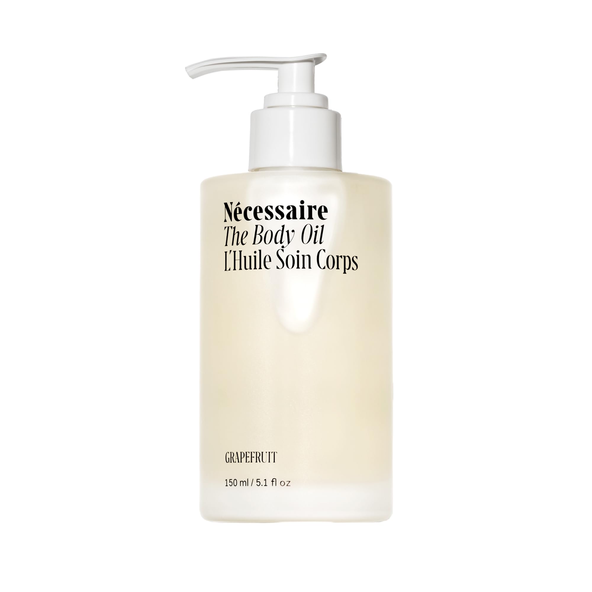 Nécessaire The Body Oil bottle pour demonstrates smooth, fast absorption for daily skincare.