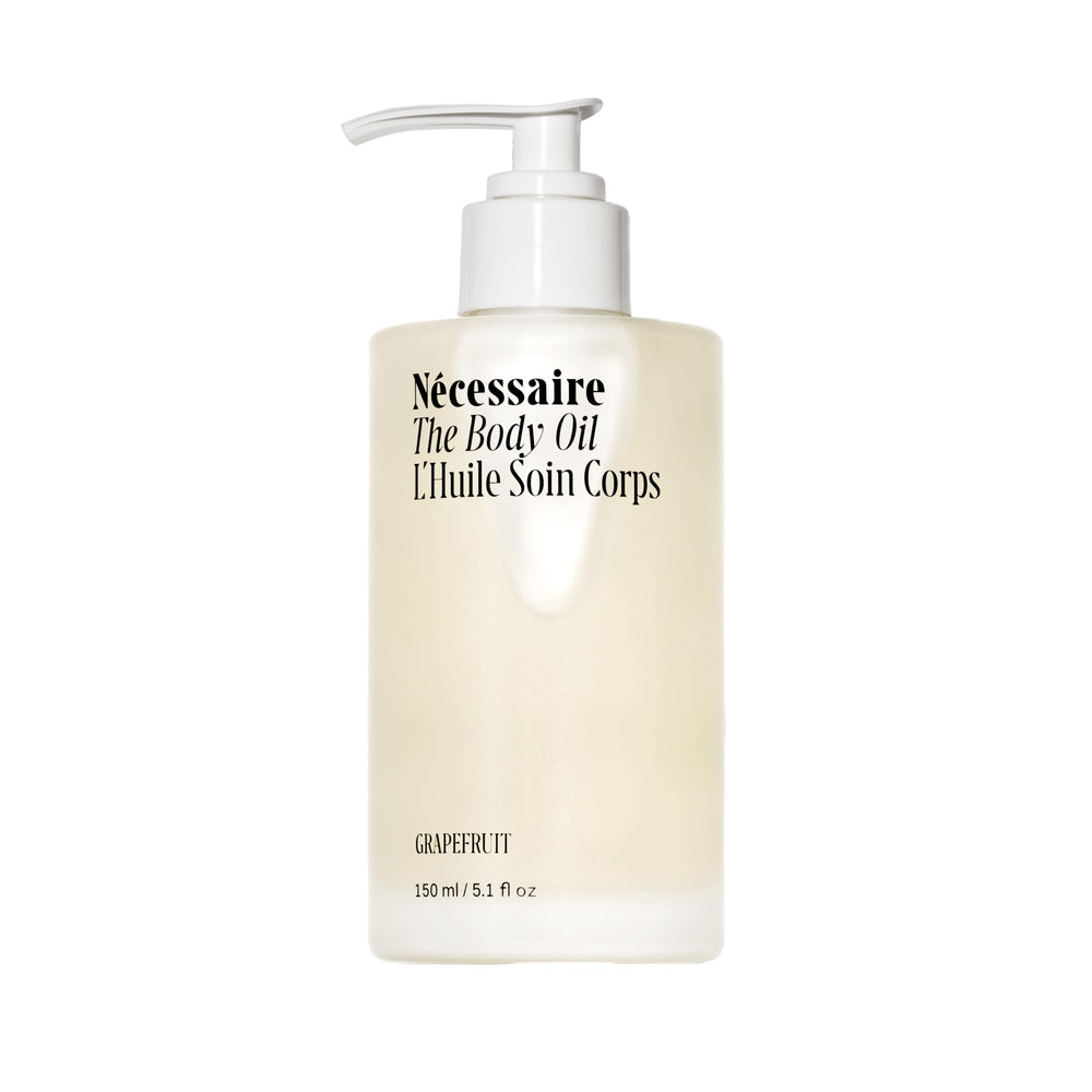 Nécessaire The Body Oil bottle pour demonstrates smooth, fast absorption for daily skincare.
