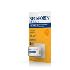 Night routine scene with Neosporin Lip Health by bedside