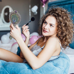 Nerien foldable mirror stand provides adjustable angles for comfort.