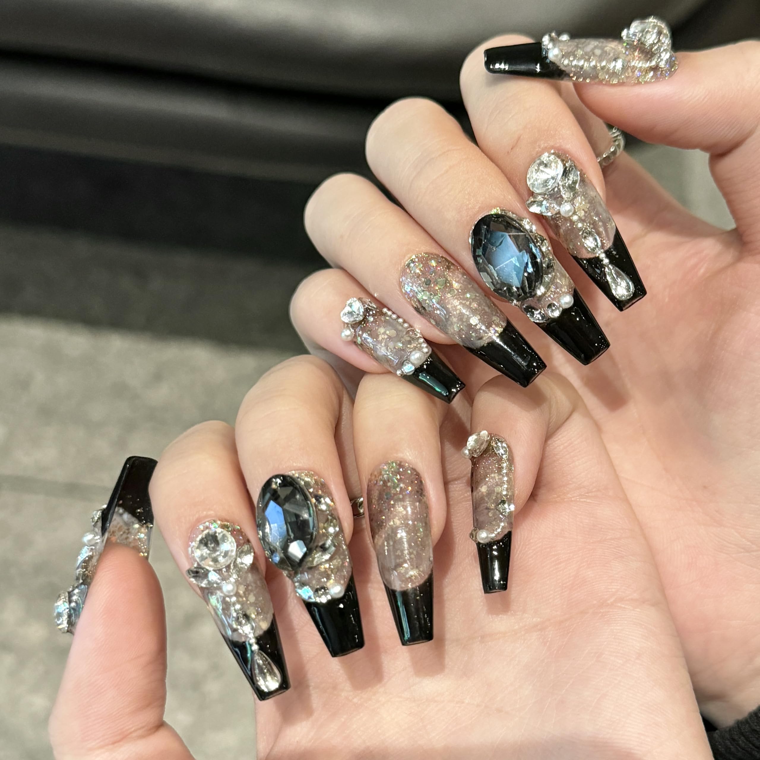 NEUQL handmade press-on nails in long square black glam on hand