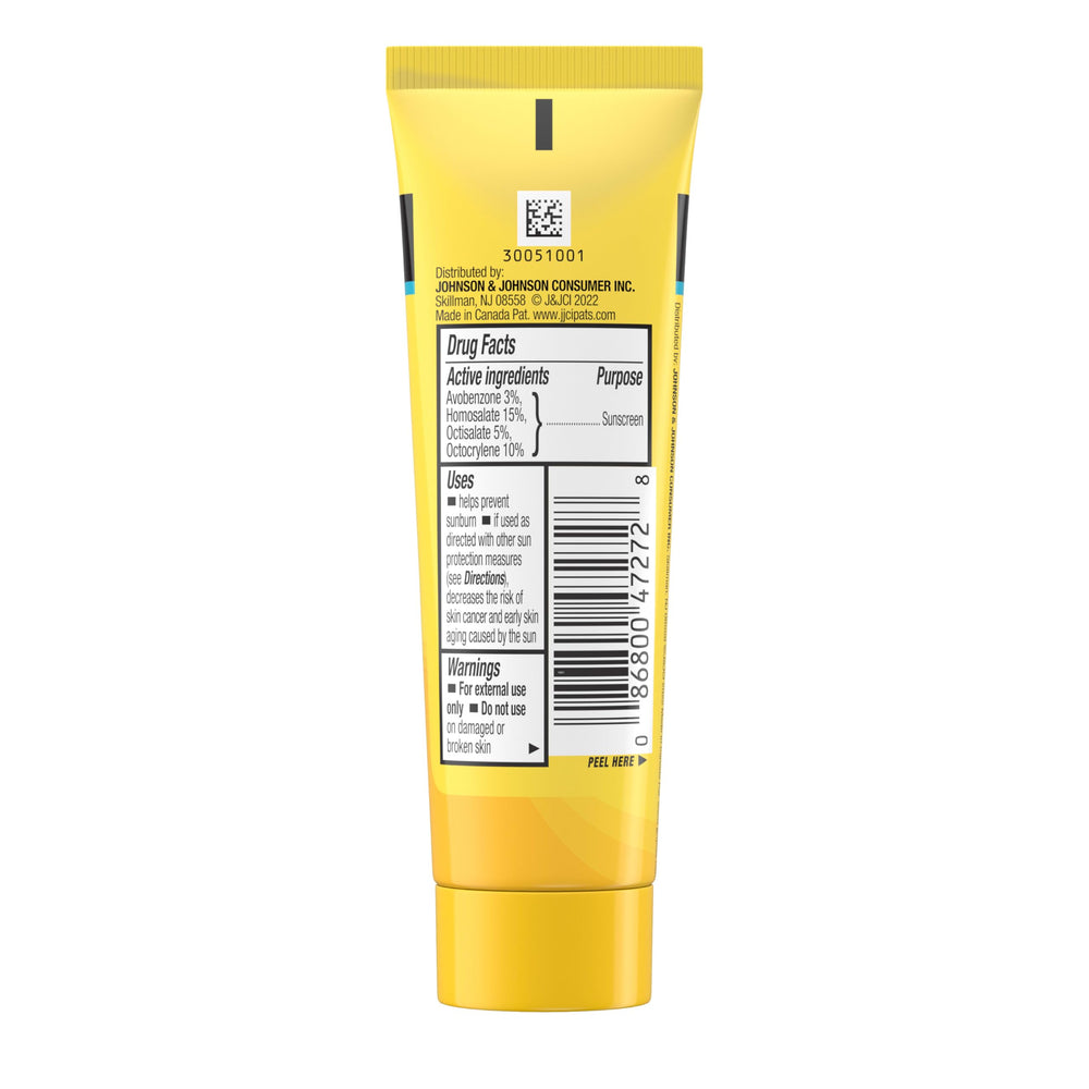 Beach scene with Neutrogena Beach Defense SPF 70 ready for sun protection.