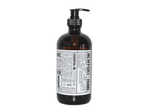 Open bottle reveals light lather and lavender fragrance for daily cleansing.