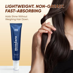 NEWUREHO lightweight serum applying on frizz-prone strands for anti-frizz control.