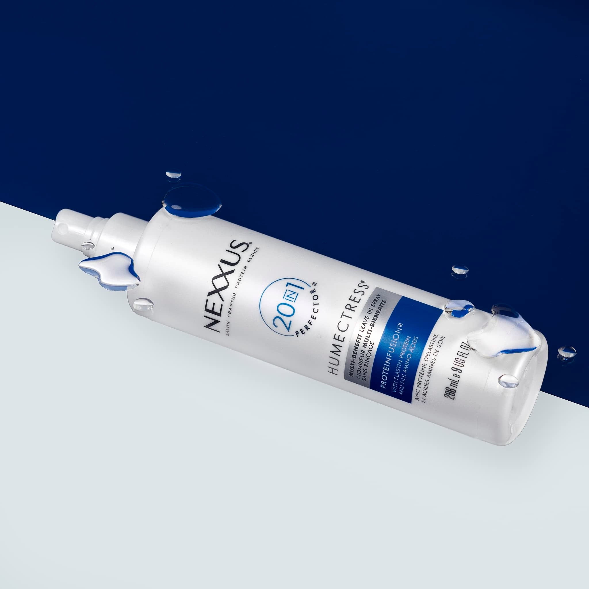 Water droplets indicating hydration from Nexxus Humectress on hair strands