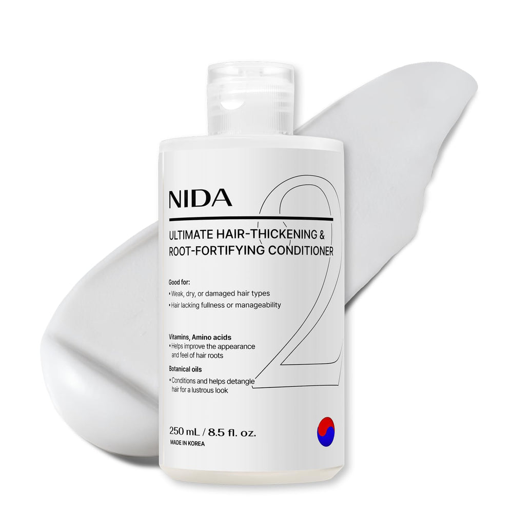 NIDA bottle pour shows smooth, even distribution for thicker-feeling hair