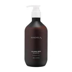NINEMILA9 Calming Beer Shampoo bottle pour for a refreshing cleanse