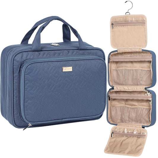 NISHEL hanging toiletry bag in Aegean blue, rolled for compact travel storage.