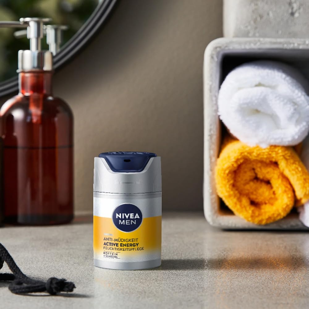 NIVEA MEN Skin Energy cream being applied to the face demonstrating fast absorption