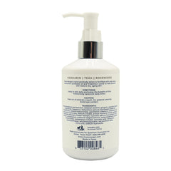 Niven Morgan lotion hand application showing silky texture for smooth, nourished skin
