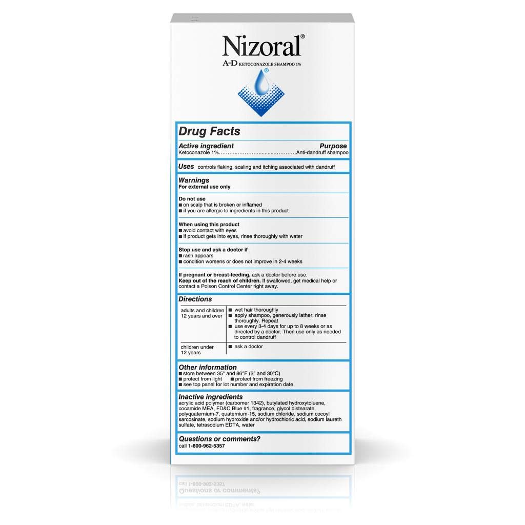 Fresh-scent Nizoral A-D foam lather on wet hair during routine wash
