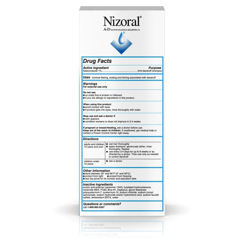 Fresh-scent Nizoral A-D foam lather on wet hair during routine wash