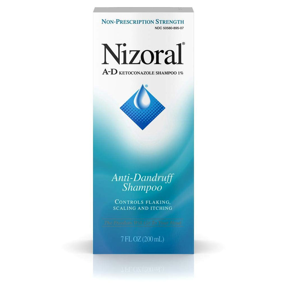 Closeup of Nizoral A-D bottle showing ketoconazole 1% active ingredient for dandruff control