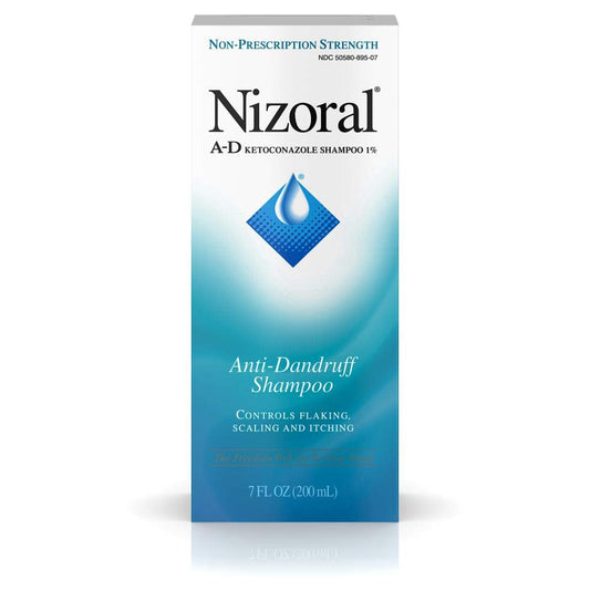 Closeup of Nizoral A-D bottle showing ketoconazole 1% active ingredient for dandruff control