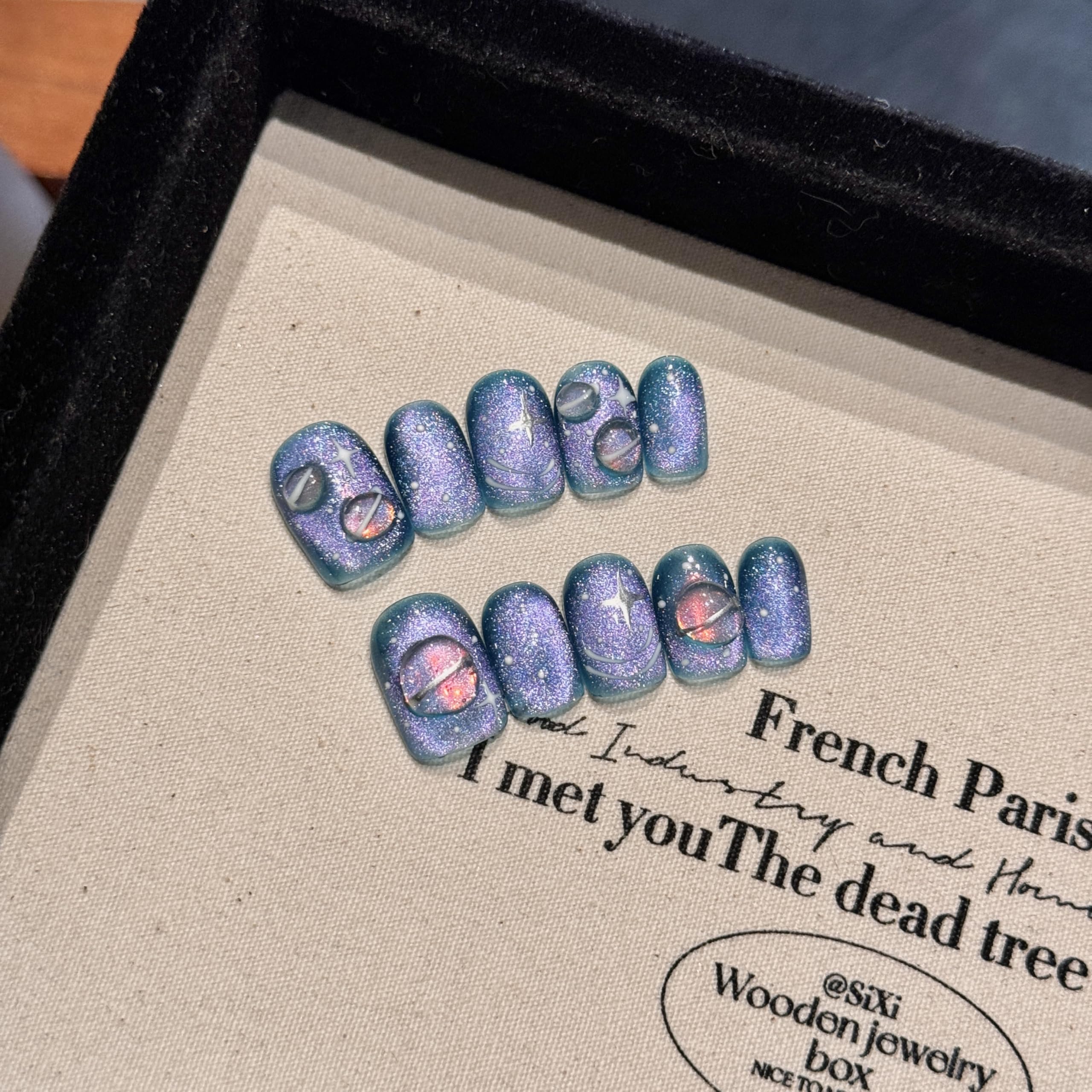 NLSJMP cosmic planet nails in blue and purple, bold everyday style.