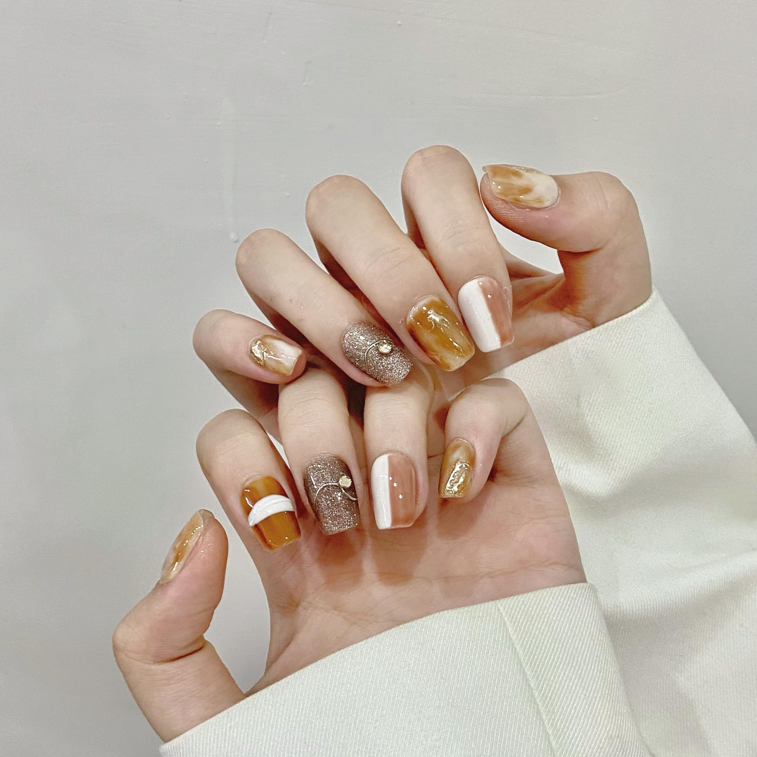 NLSJMP press-on nails kit showing 10 pieces in size S for quick wear