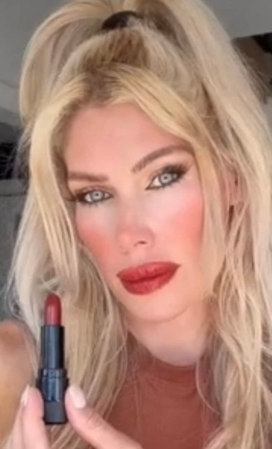 NNYL BEAUTY Burnt Amber lipstick application shows smooth glide and hydration