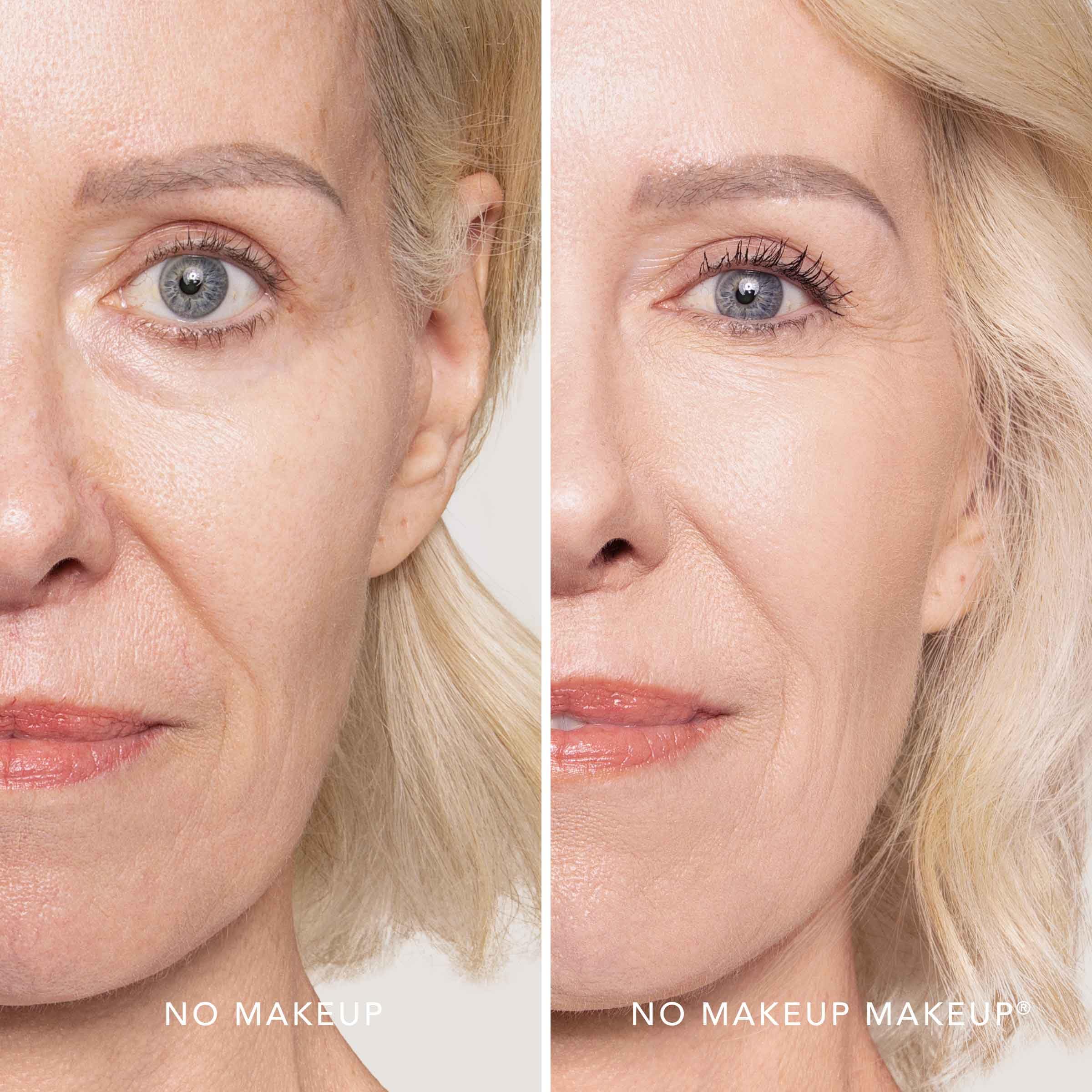 Brush applying buildable coverage of No Makeup Makeup Foundation on cheek