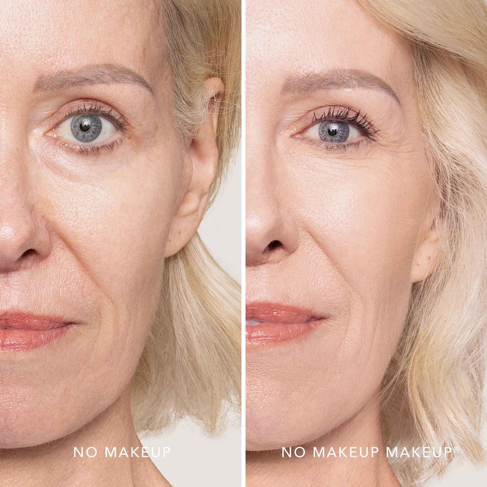 Brush applying buildable coverage of No Makeup Makeup Foundation on cheek