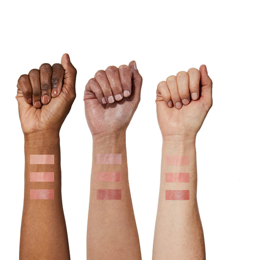 Swatch of No7 Lip & Cheek Tint on skin showing buildable color
