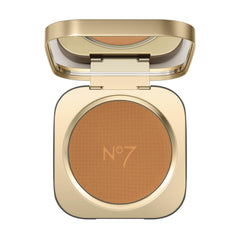 No7 Pro Artist Soft Glow Bronzer Powder packaging closeup for on-the-go warmth.