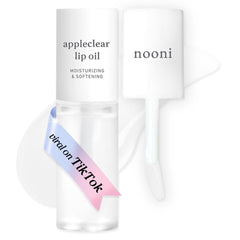 NOONI Appleclear Lip Oil bottle closeup showing glassy hydration for dry lips.