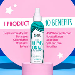 Not Your Mother's All Eyes On Me mist being sprayed on damp hair for detangling.