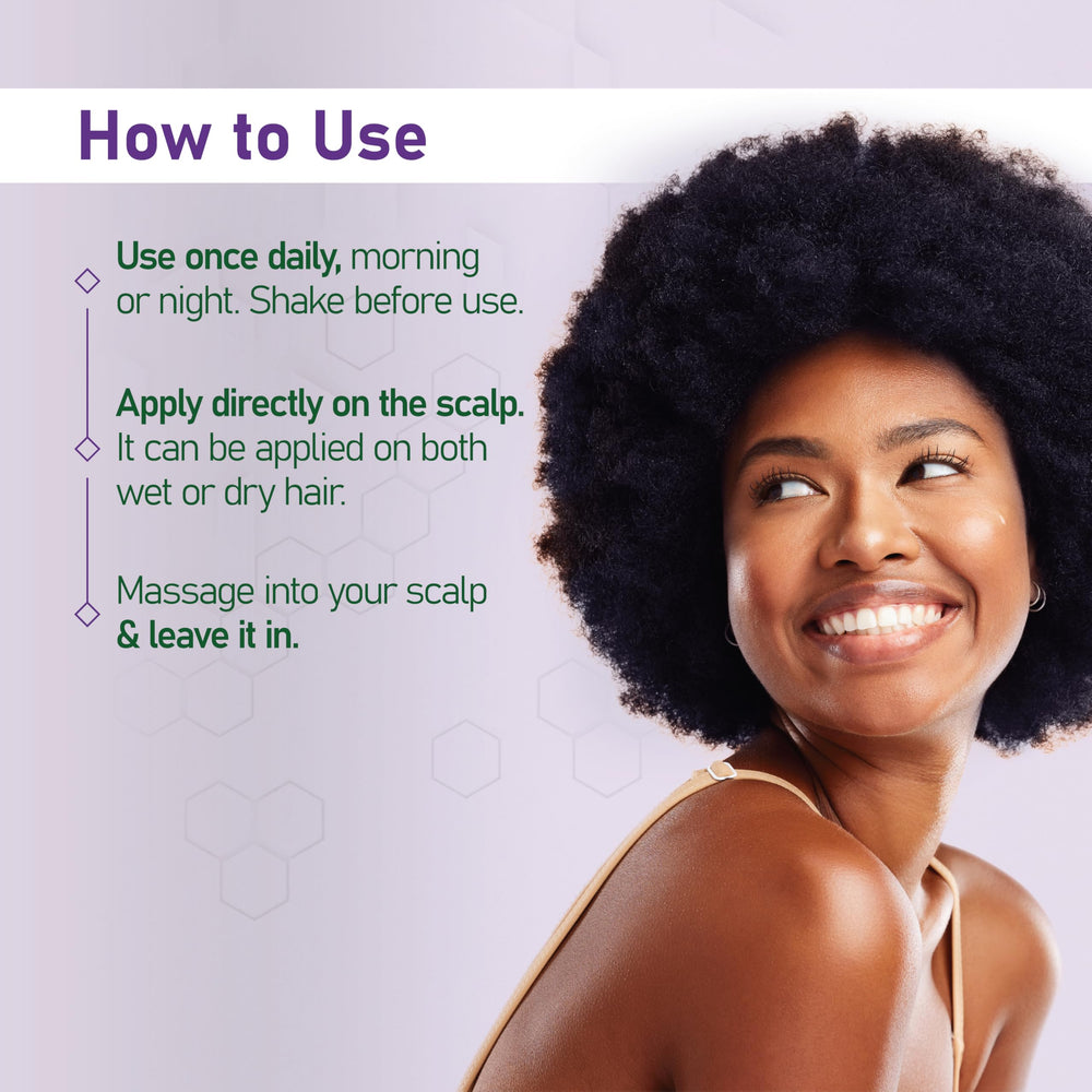 Hands massaging serum into scalp during routine care