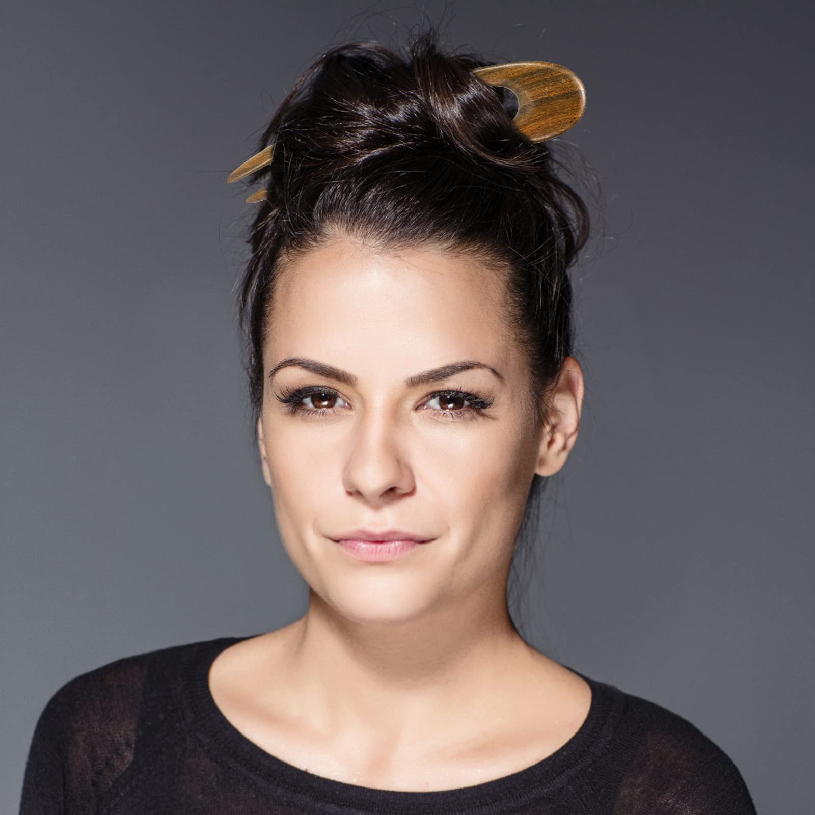 Noverlife elegant updo with two-prong pins demonstrates versatility.