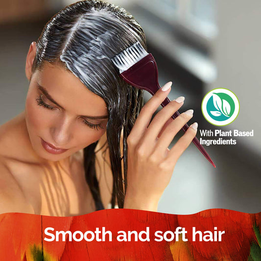 NOVEX Brazilian Keratin conditioner bottle smooths and softens hair.