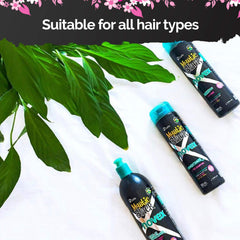 NOVEX Mystic Black Conditioner bottle close-up for smoother, manageable hair.
