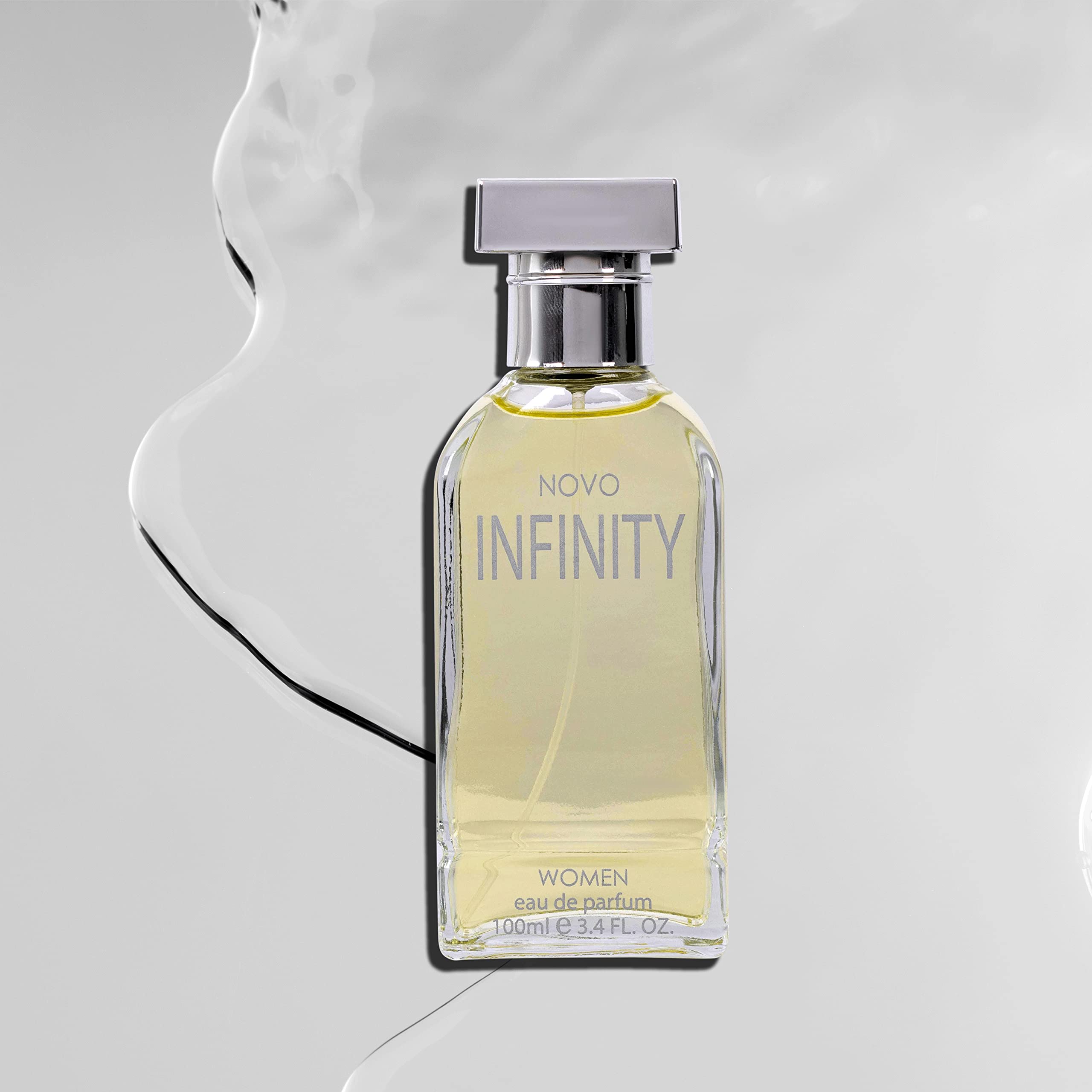 Close-up of NovoGlow Infinity glass bottle with embossed label